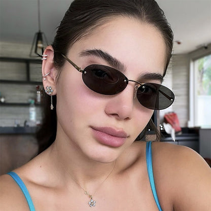 Elliptical frameless sunglasses