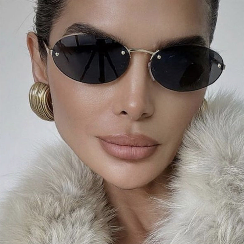 Elliptical frameless sunglasses